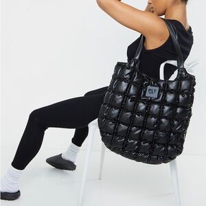 Pretty little thing Black Quilted Tote Bag